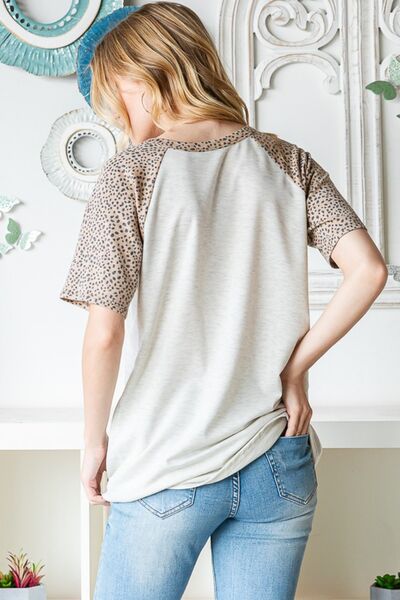 Heimish Full Size Animal Print Half Button Short Sleeve Top Shop One Place