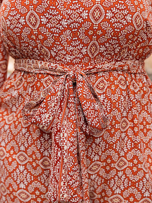 Plus Size Printed V-Neck Tie Front Balloon Sleeve Jumpsuit Shop One Place